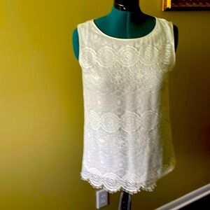 Lace tank top with beautiful design details.